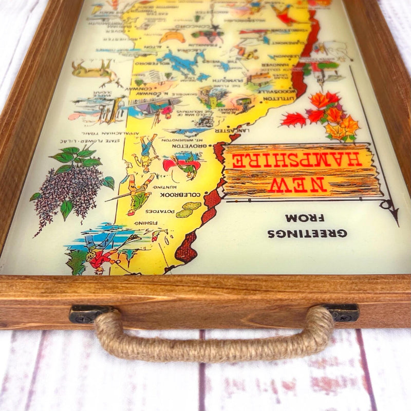 vintage Map of New Hampshire with pictoral travel map illustrations on a wooden serving tray.  Vintage new hampshire map. vintage new hampshire post card.