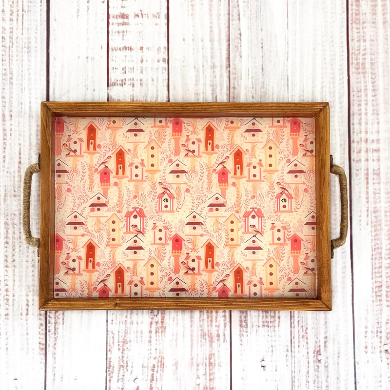 handcrafted wooden serving tray featuring coral, peach and yellow bird houses with colorful birds for entertaining and gift giving